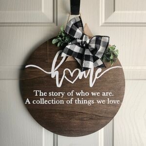 Round Wooden 'Home' Wall Sign with Buffalo Check Bow